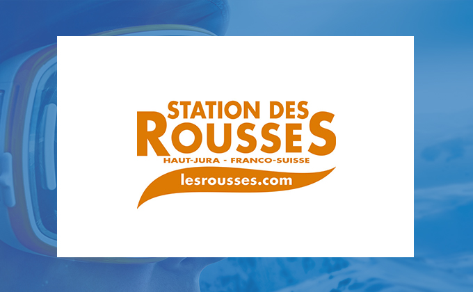 Logo Station Des Rousses sur fond de montagne